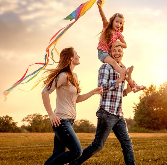 Family flying a kite